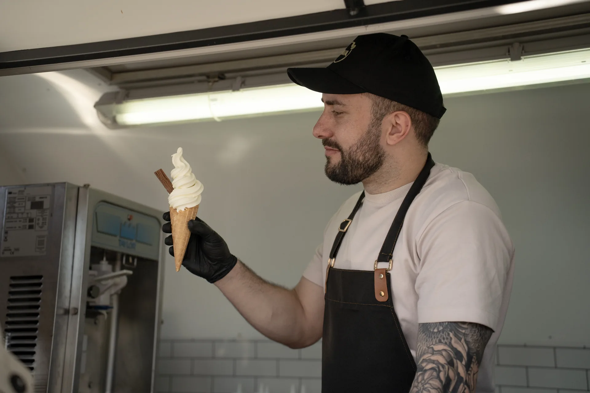 Freshly swirled vanilla cone with a flake